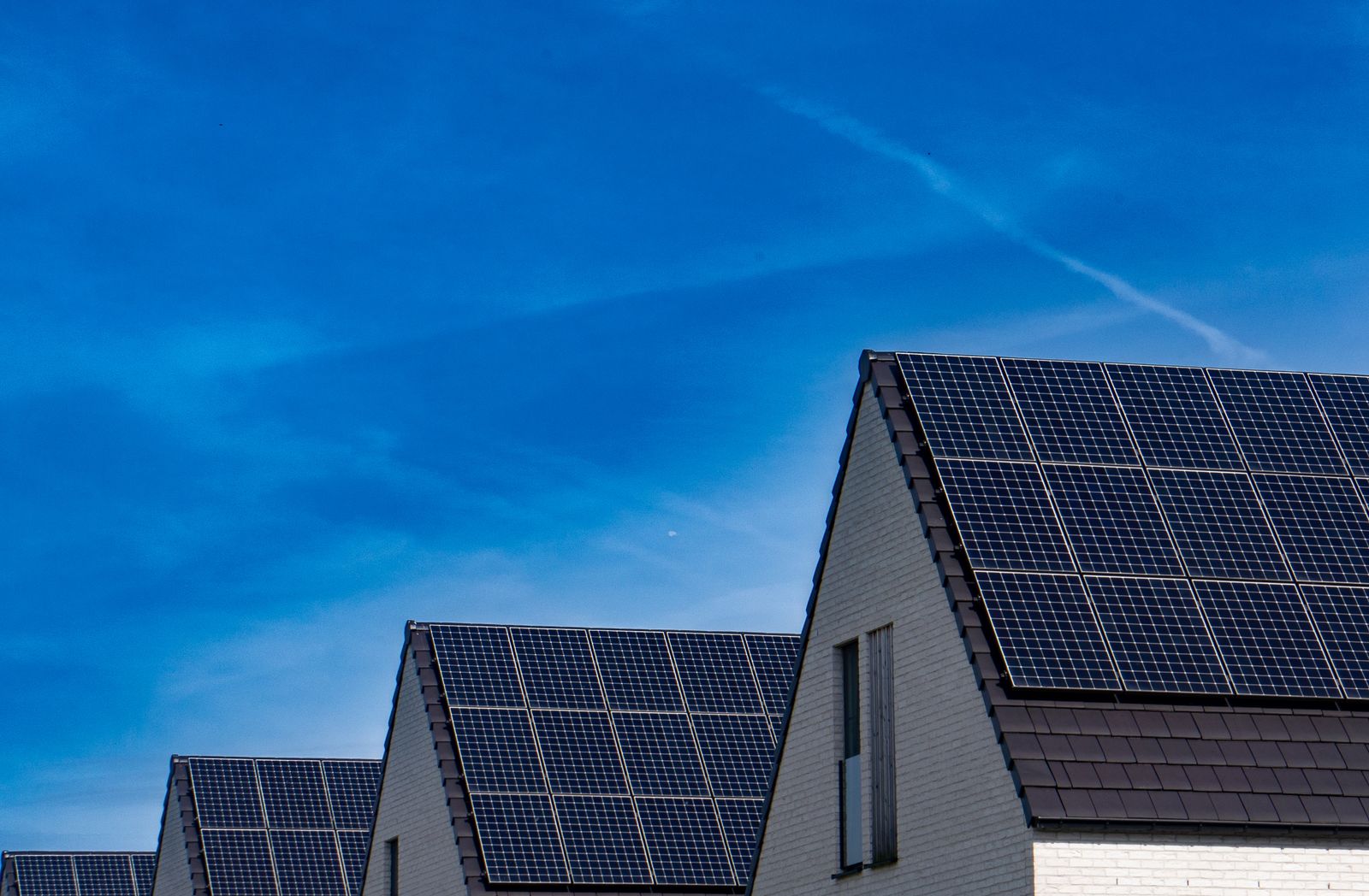 Solar panels under a clear blue sky installed by Solevo Infraprojects